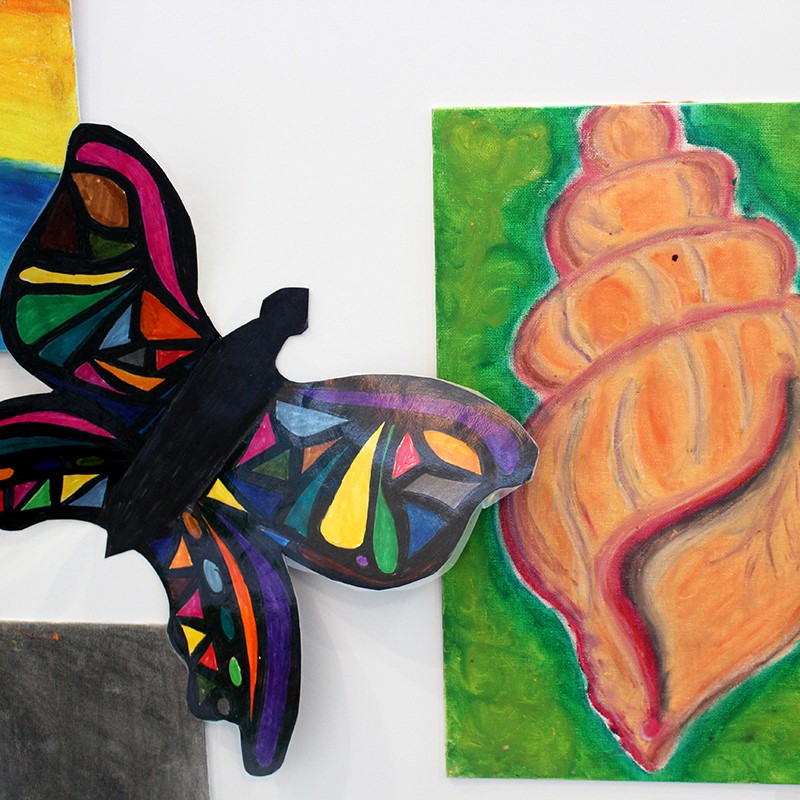 Colorful abstract butterfly and vibrant conch shell painting on canvas