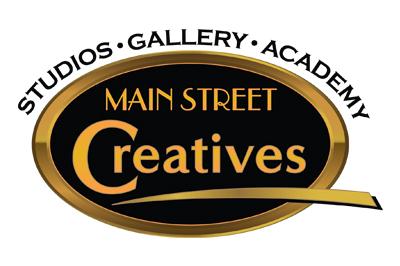 Main Street Creatives logo, black oval with gold text and border, words: Studios, Gallery, Academy