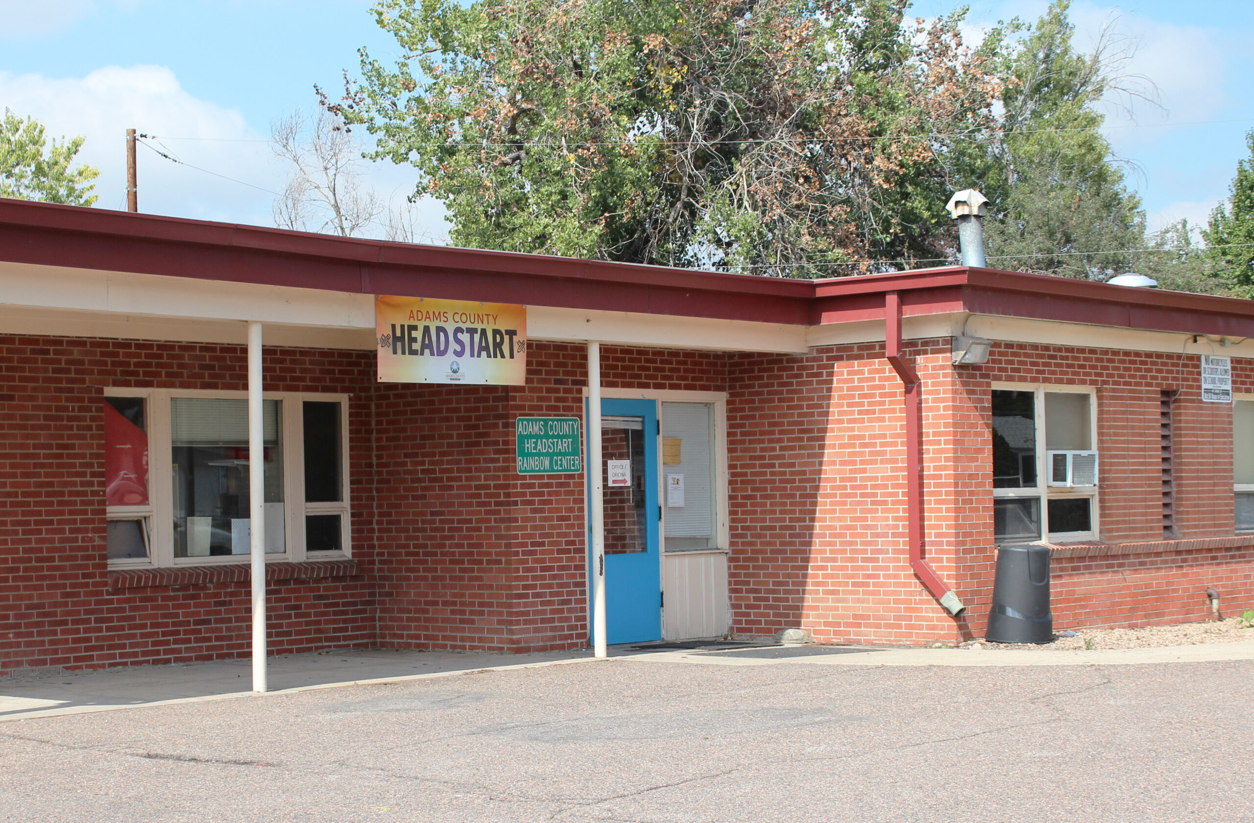 Adams County Head Start building with red brick walls and signage