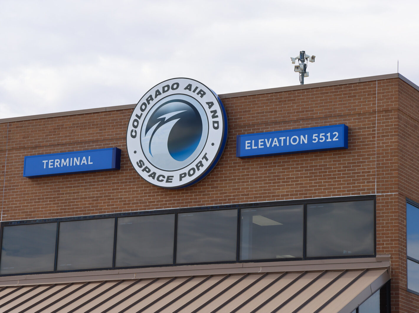 Colorado Air and Space Port sign, labeled "Terminal" and "Elevation 5512"