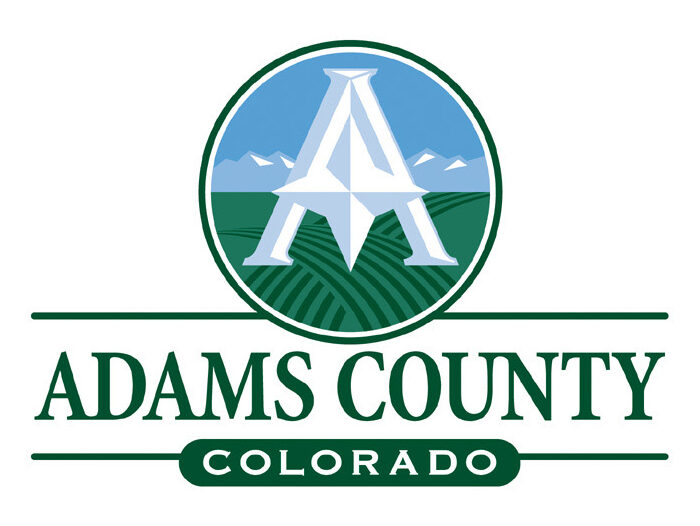 Adams County logo, features stylized "A" over fields, mountains in background.