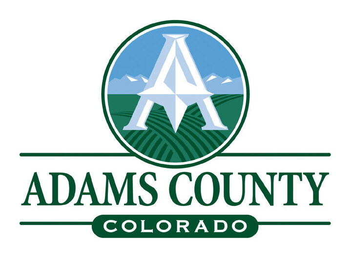 Adams County logo, large letter "A" over green fields, mountains in background