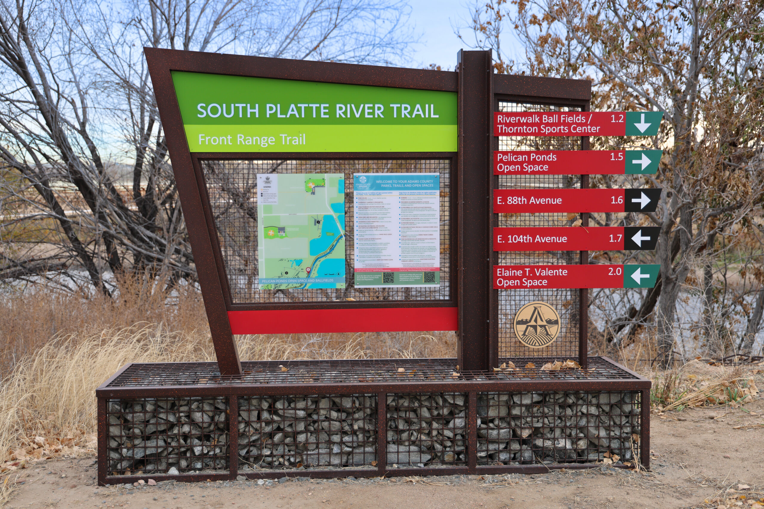 Sign for South Platte River Trail with map and directions to local parks and open spaces