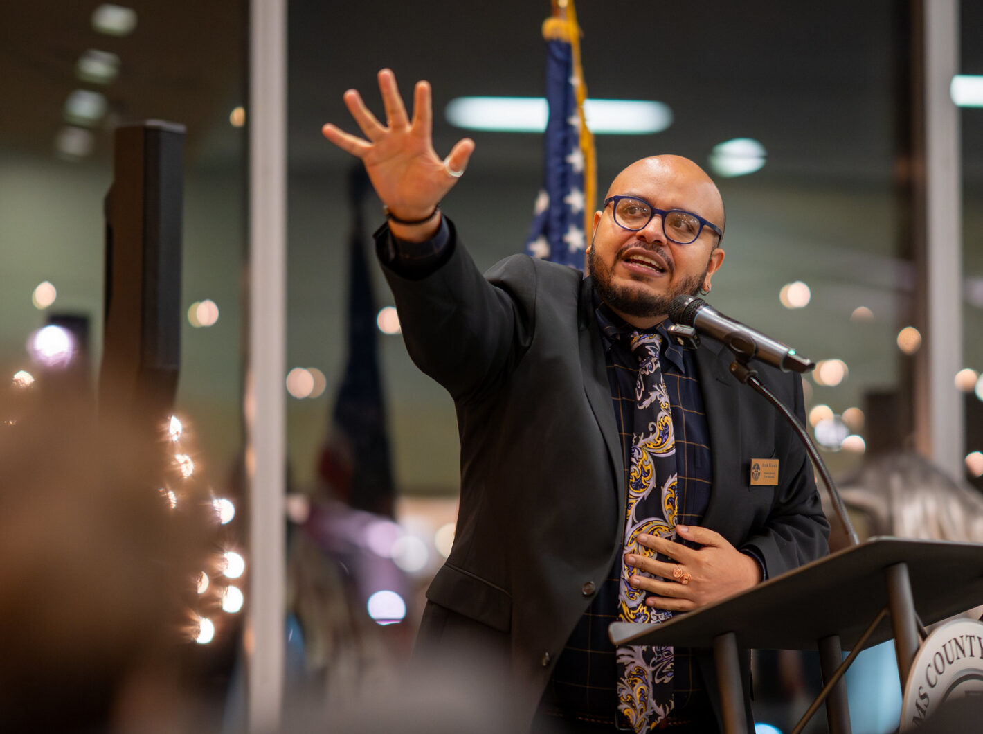 Aerik Francis speaking during an open mic.