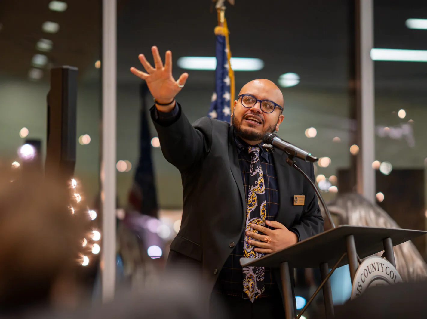 Aerik Francis speaking during an open mic.