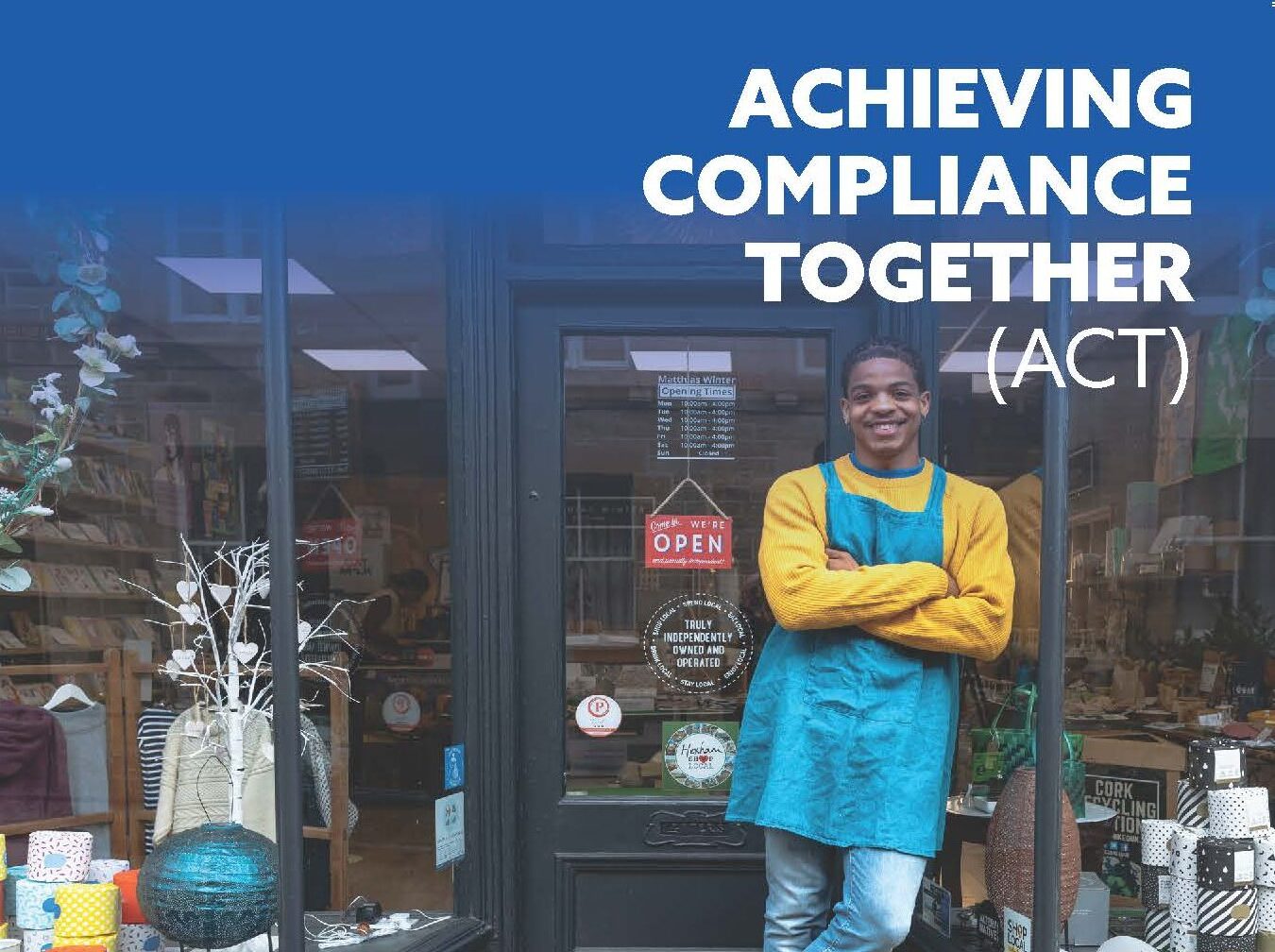 Achieving Compliance Together banner featuring man crossing his arms.