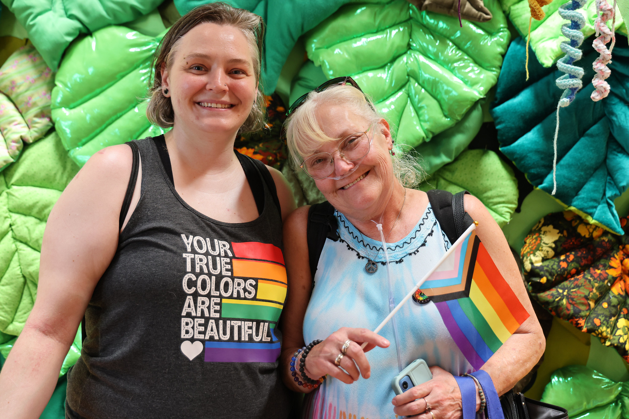 Couples posing for Pride.