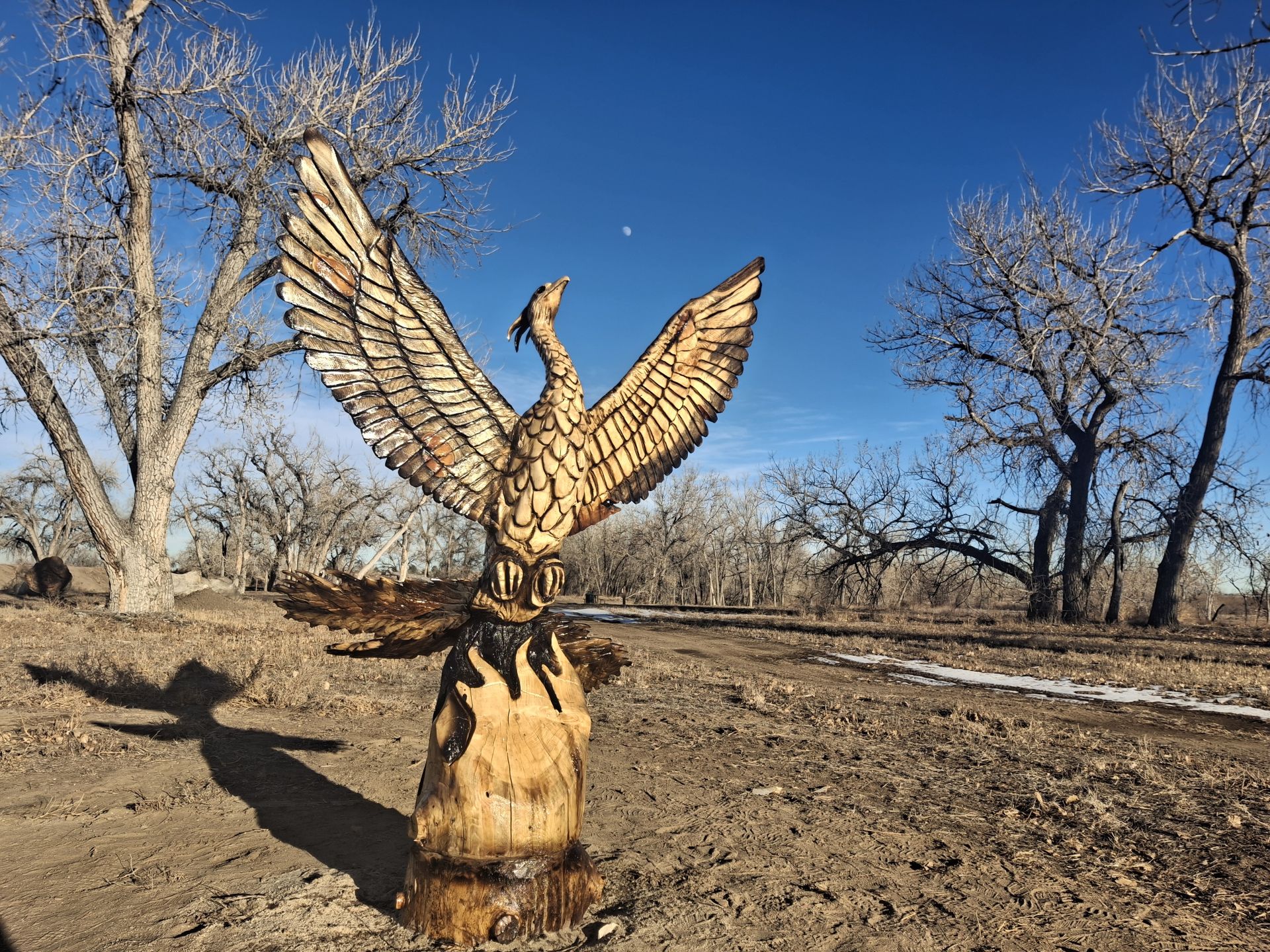 Wood carving of phoenix.