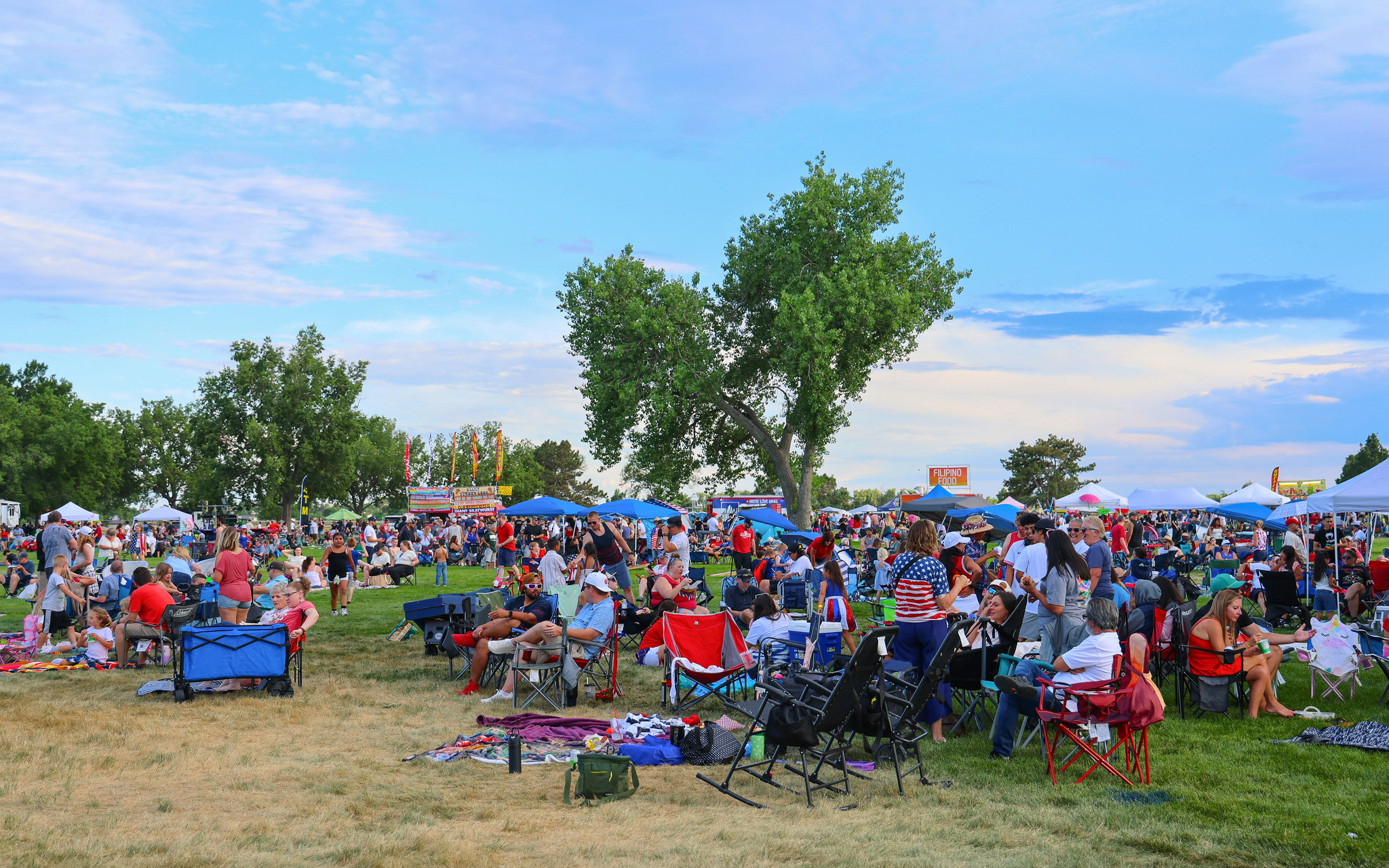 Family watching concert at Stars & Stripes