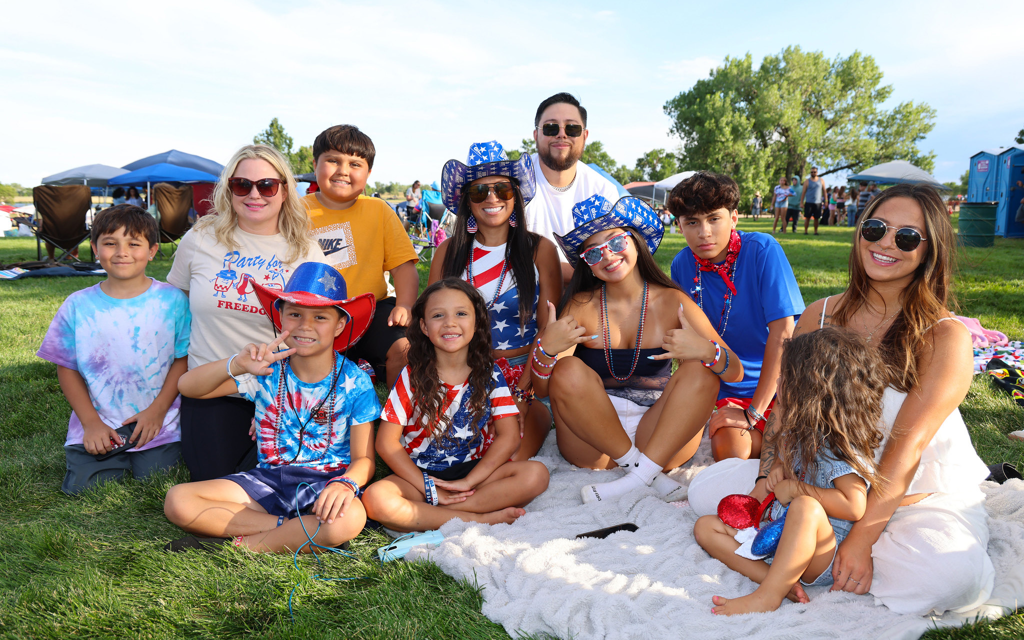 Family posing at Stars & Stripes