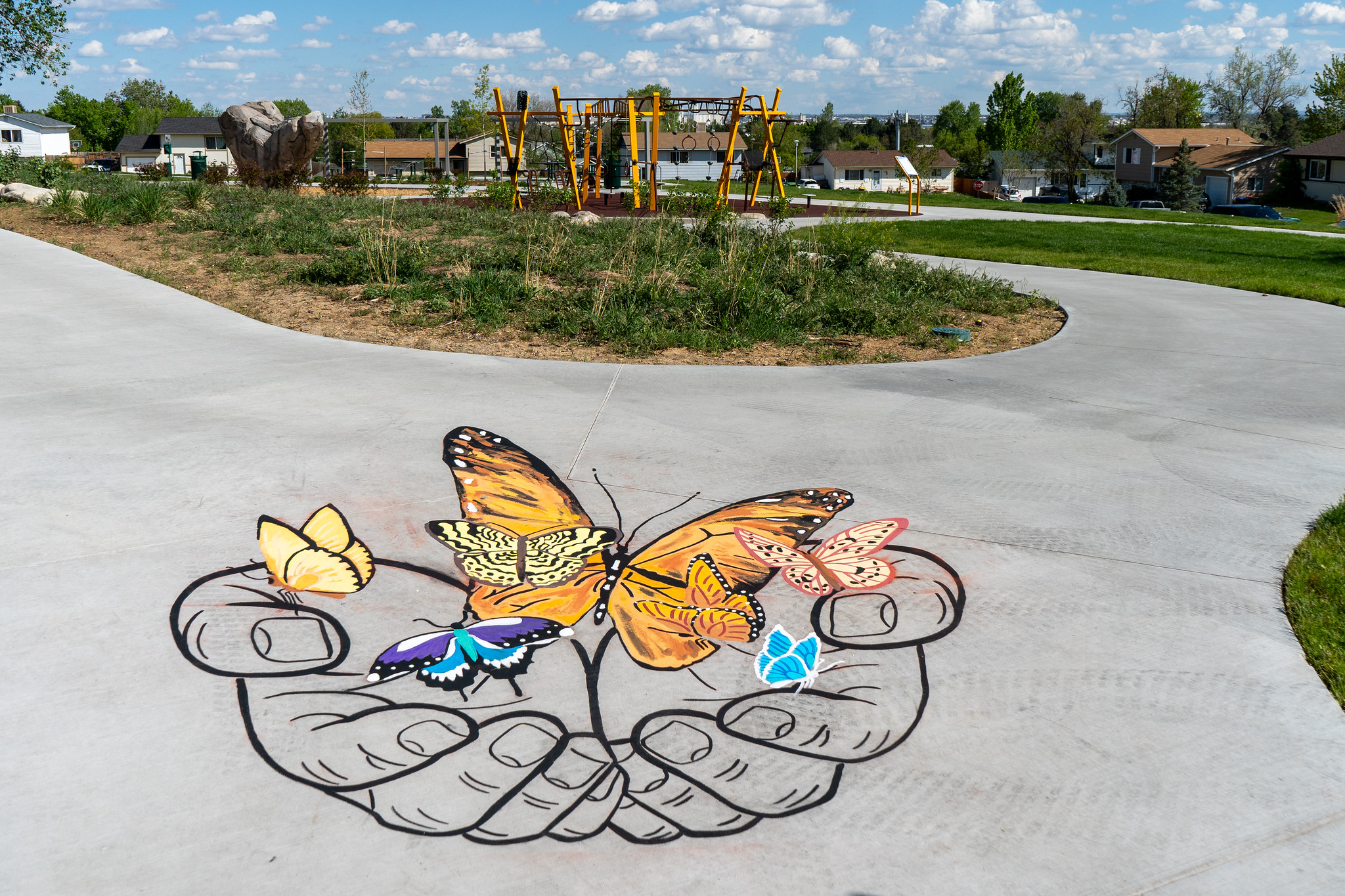 Chalk drawings on sidewalks.